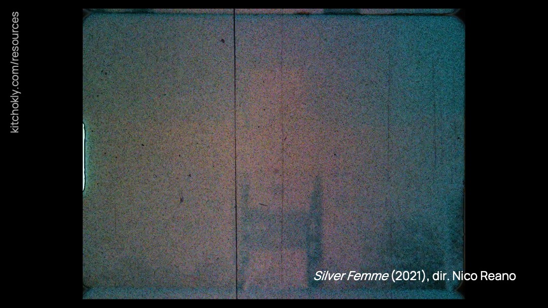 The text disappears and the frame turns into a loop of Silver Femme's title card sequence. This video can be accessed at https://www.nicoreano.com/silver-femme-2021#e-1. The bottom right-hand corner reads "Silver Femme (2021), dir. Nico Reano." The rotated URL remains.